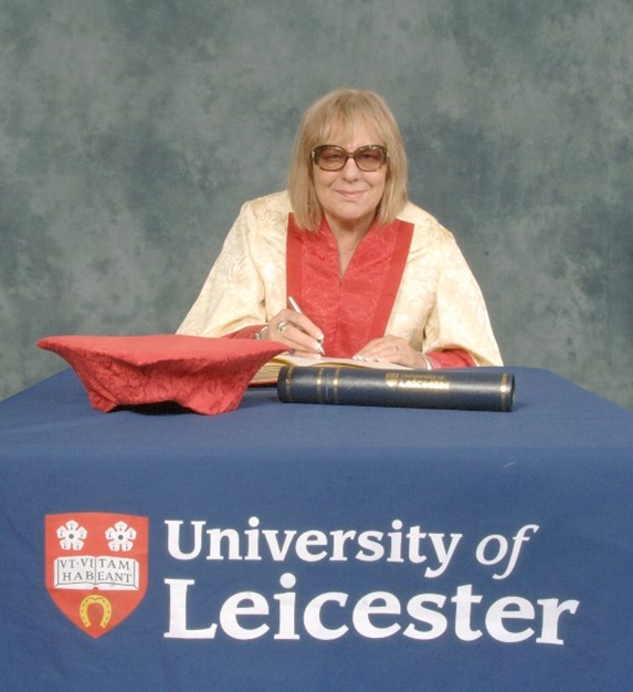 Formal portrait photograph of Sue Townsend at the University of Leicester, having received a Distinguished Honorary Fellowship, 2008.