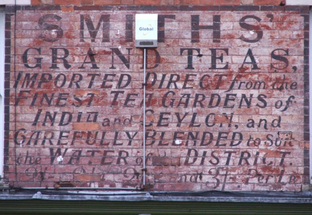 Colour photograph of a ghost sign for Smith's Grand Teas on Oakham Road